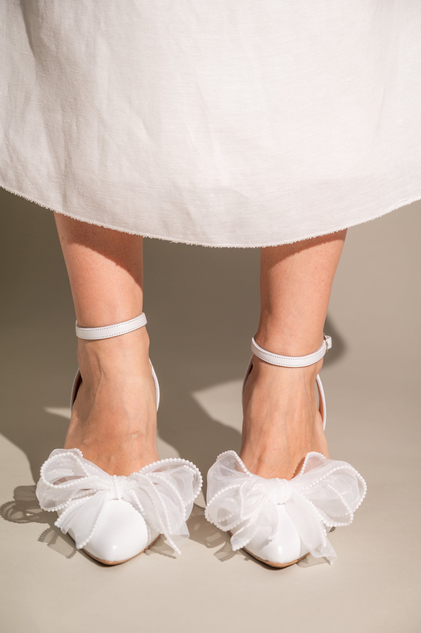 white wedding shoes,
wedding shoes low heel,
wedding heels for bride,
pearl wedding shoes