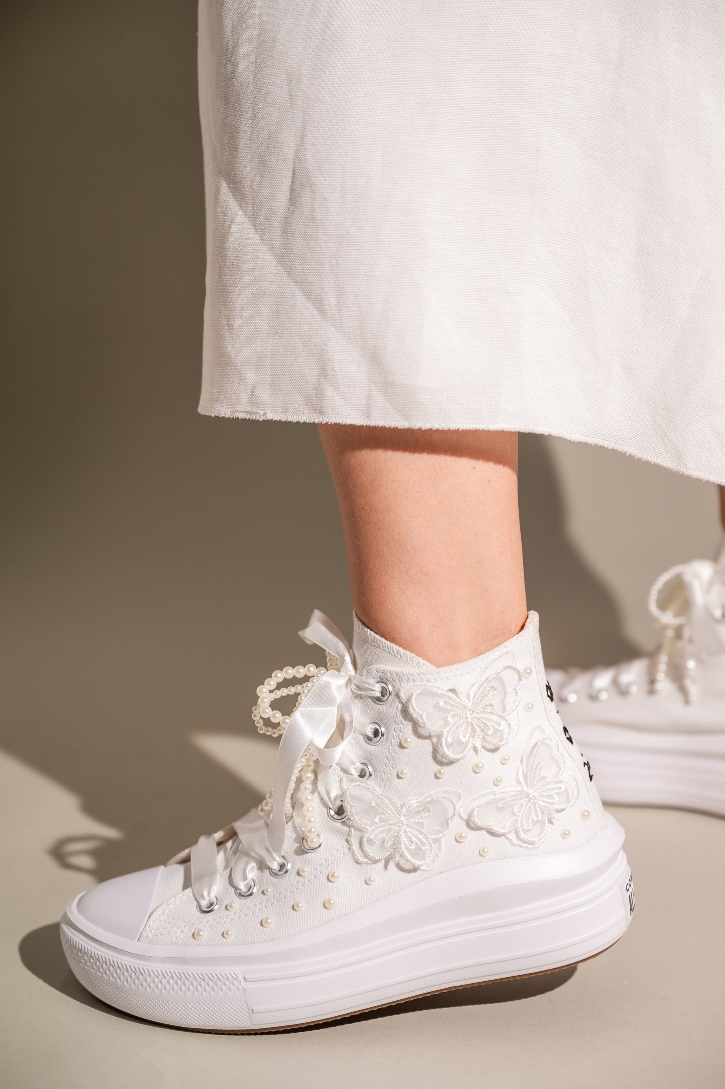 white bridal sneakers,
wedding reception shoes,
wedding shoes designer