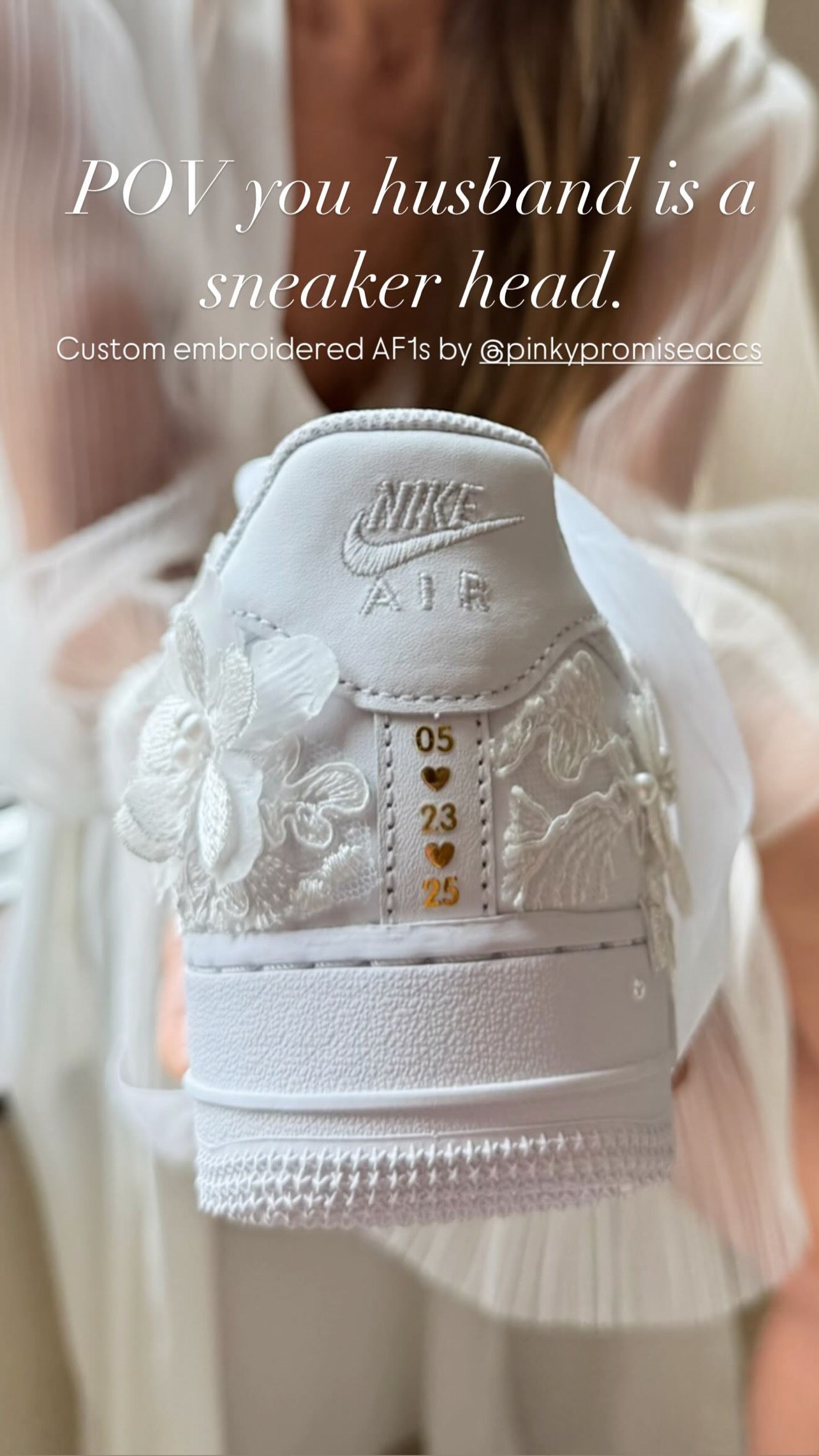White sneaker with custom embroidery held by a person, text overlay about husband being a sneaker head.