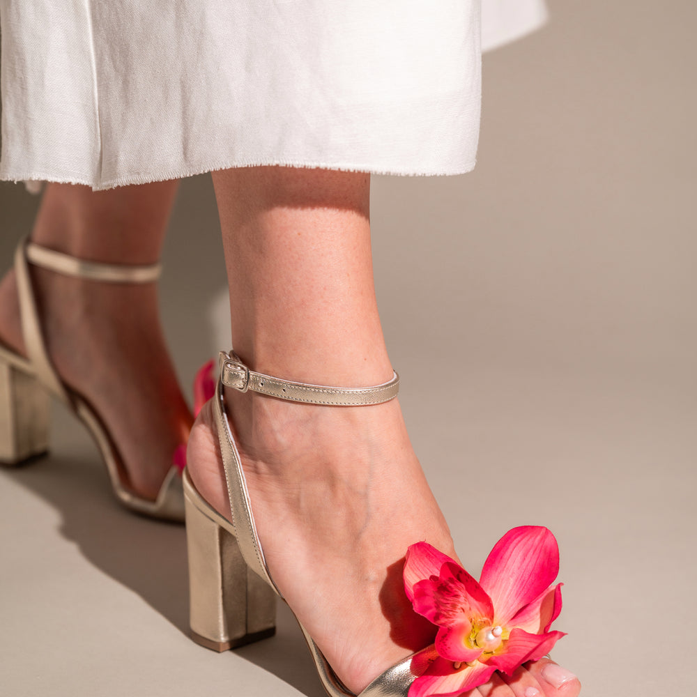 
                  
                    dolce and gabbana flower heels, golden heels
                  
                