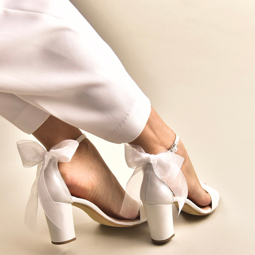 
                  
                    tulle bow heels
                  
                