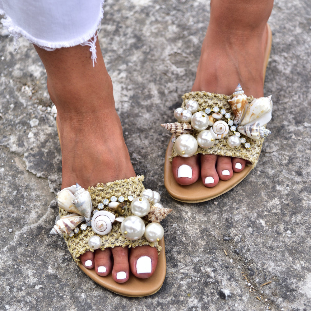 
                  
                    sandals with shells
                  
                